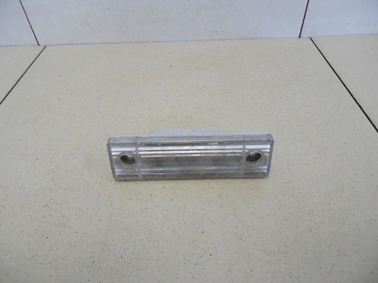 Фонарь подсветки номера Aveo (T200) 2003-2008