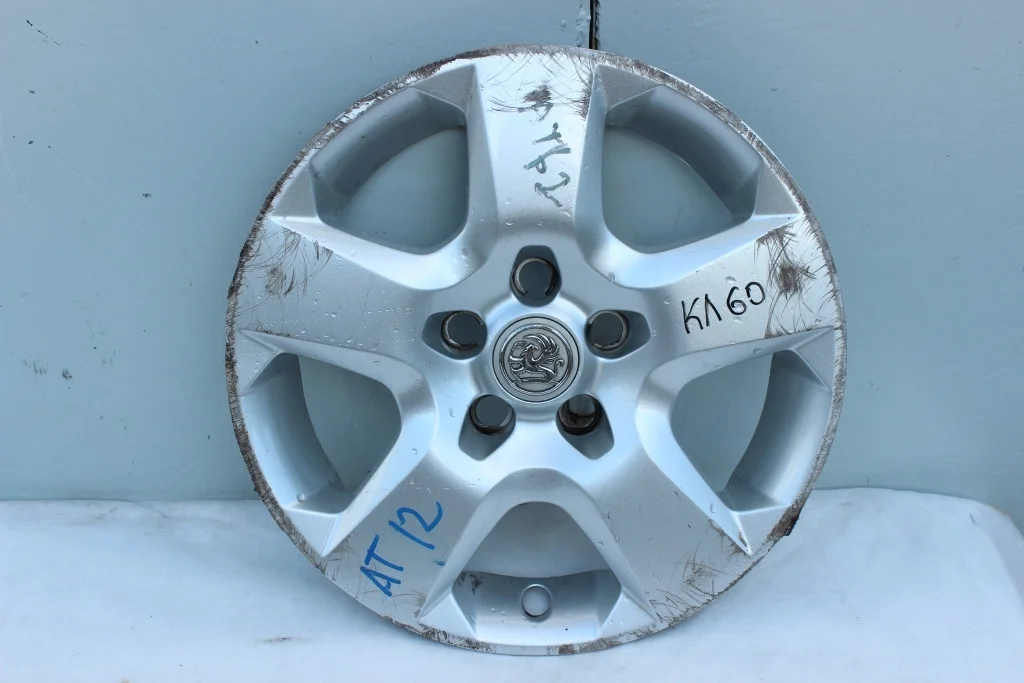 Колпак структурного диска R16 Opel Astra H КЛ60