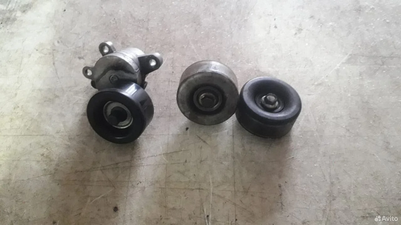 Ролик натяжной обводной Nissan Teana J32