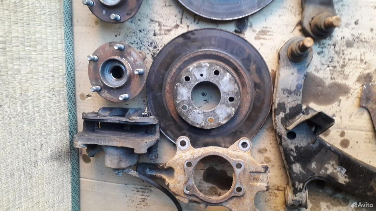 Суппорт тормозной передний Ниссан Теана J31