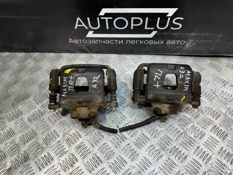 Суппорт тормозной Nissan Cefiro 1997 41011JN00A A32 VQ20DE, передний