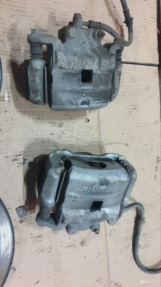 Суппорт тормозной передний Ниссан Теана J31