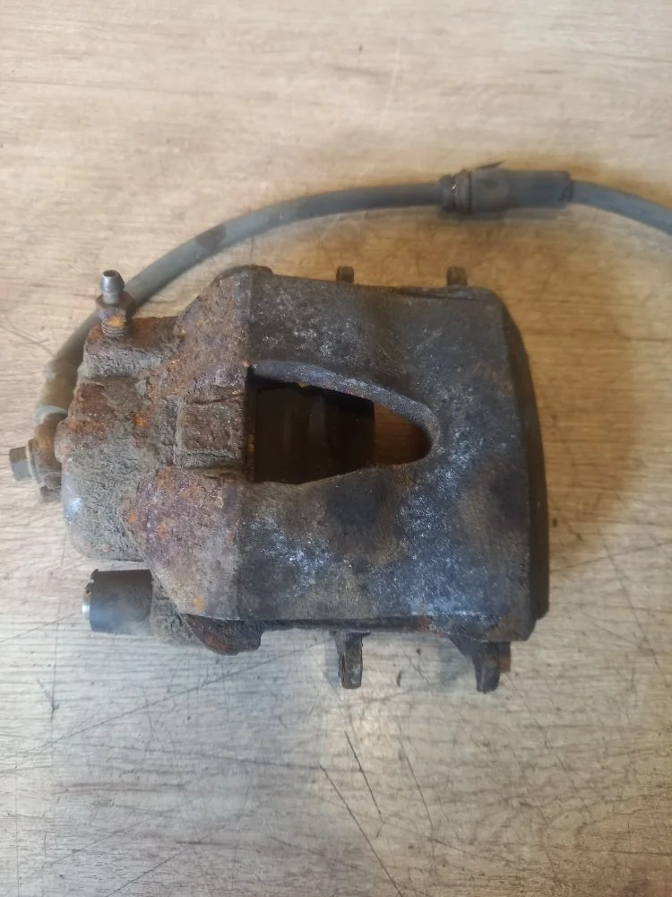 Суппорт тормозной передний левый Skoda Octavia II рестайлинг (2008—2013) 2012 8B/F7W