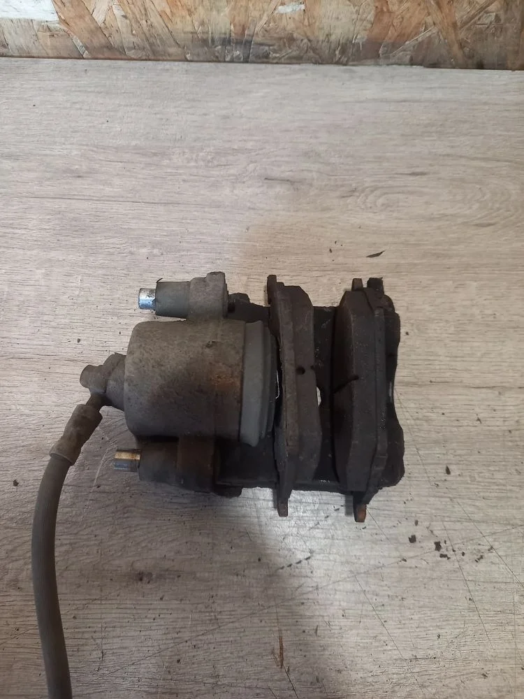 Суппорт тормозной передний левый Skoda Octavia II рестайлинг (2008—2013) 2013 2G