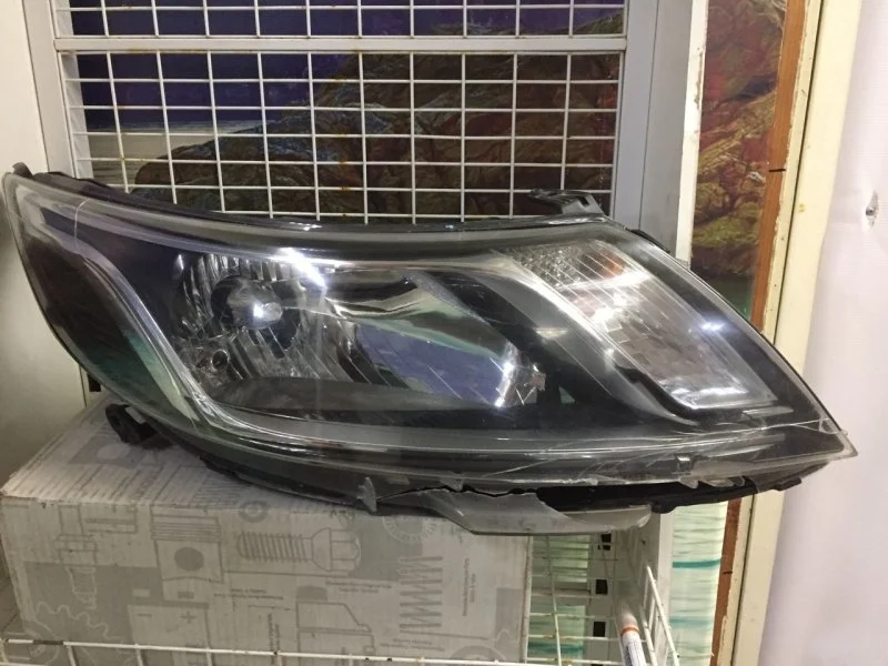 Фара Kia Rio 921024X000, правая