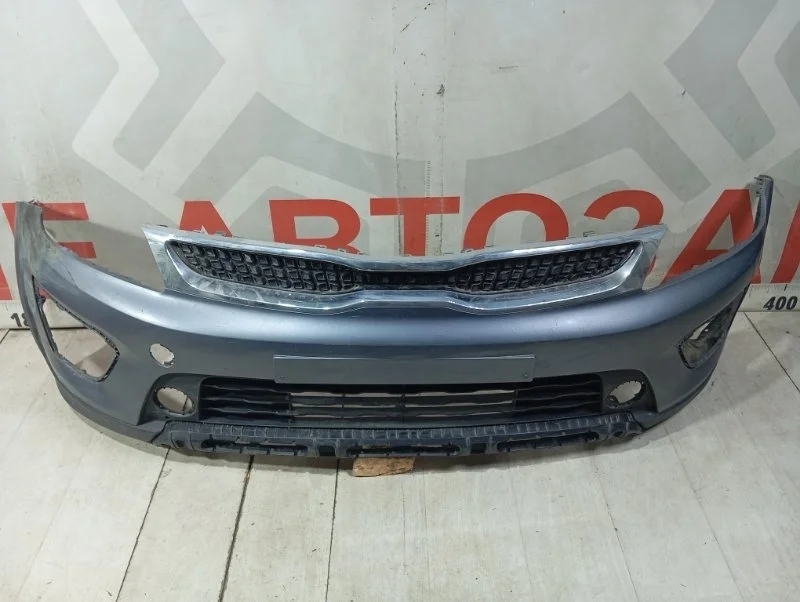 Бампер передний с решеткой радиатора Kia Rio