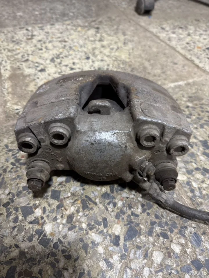 Суппорт тормозной передний левый vag