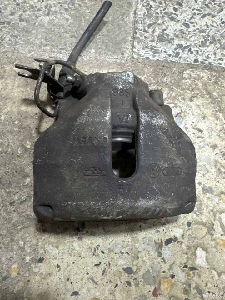 Суппорт тормозной передний левый vag