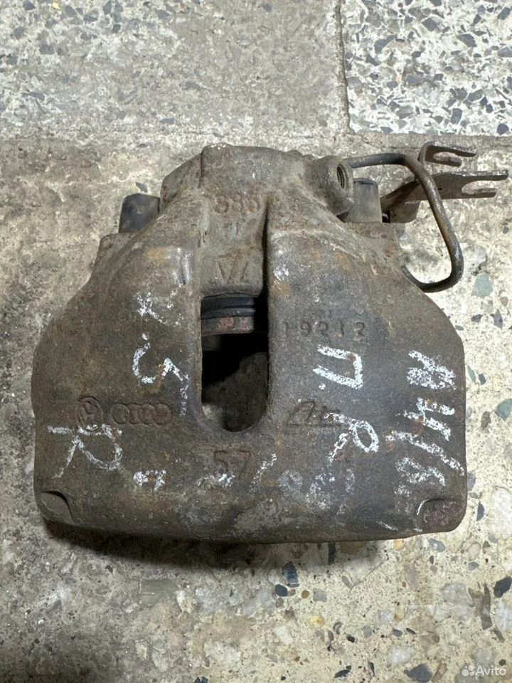 Суппорт тормозной передний правый vag