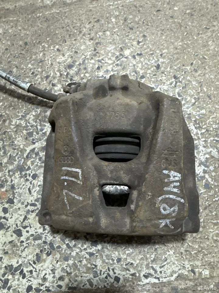 Суппорт тормозной передний левый vag