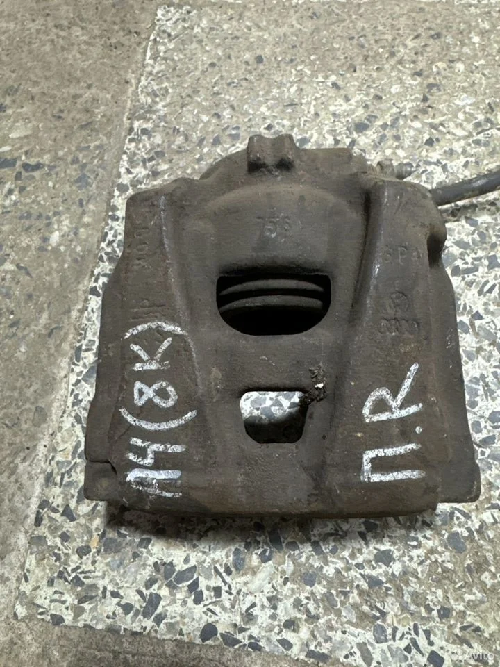 Суппорт тормозной передний правый vag