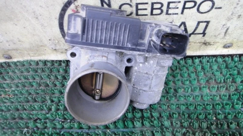 Дроссельная заслонка Nissan Almera B10