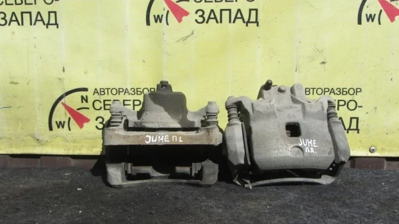 Суппорт тормозной Nissan Juke 41001JN00A YF15 HR16DE, передний правый