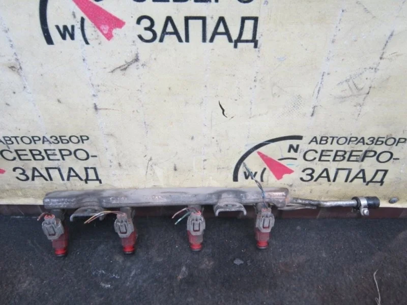 Форсунка Nissan Almera 166009F600 N16 QG15