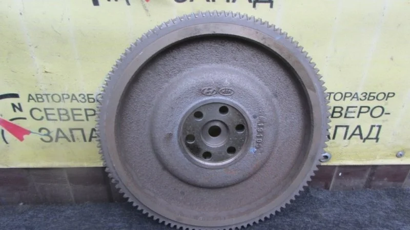 Маховик Kia Rio 232002B001 QB G4FC