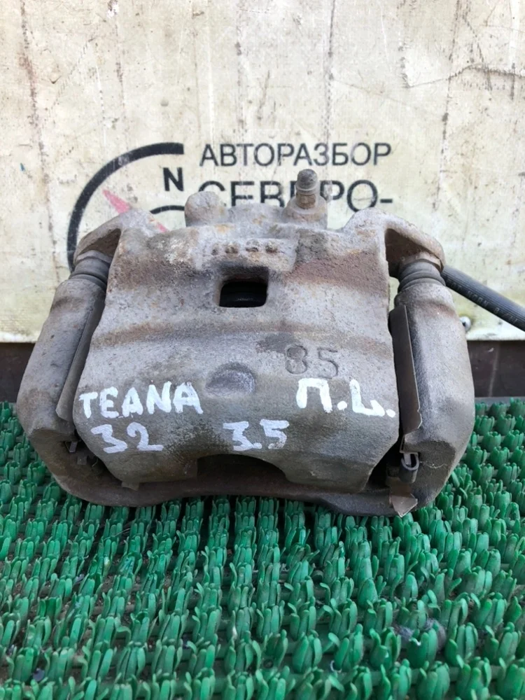 Суппорт тормозной Nissan Teana 2011 41011JN00A J32 VQ35DE, передний левый