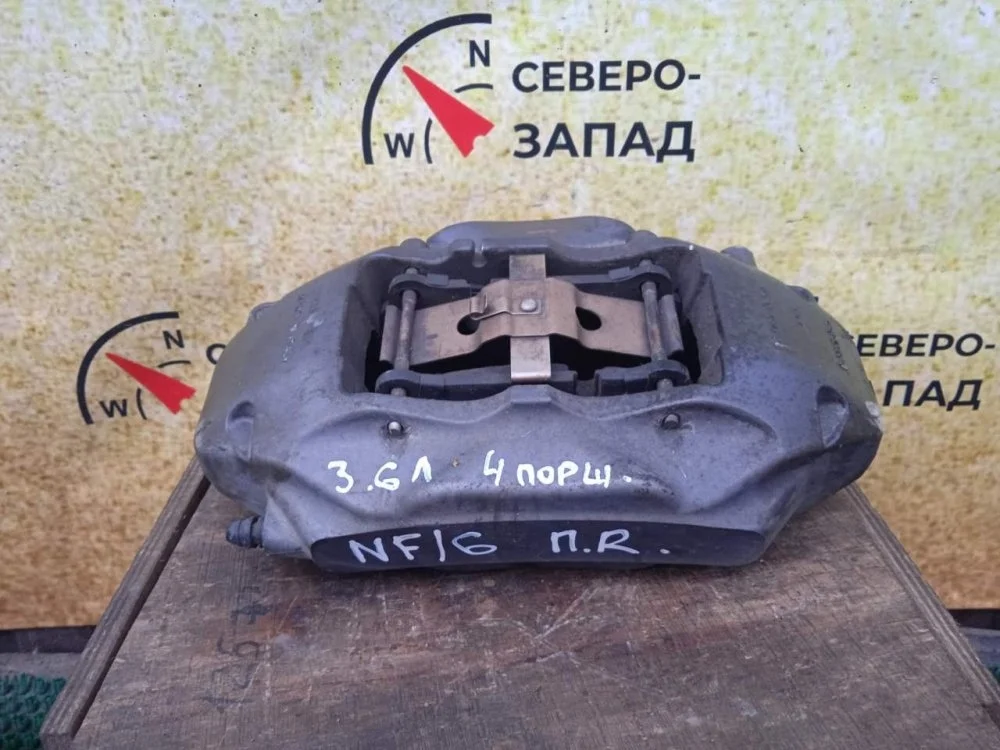 Суппорт тормозной Volkswagen Touareg 2011 7L6615150A NF CMTA, передний правый