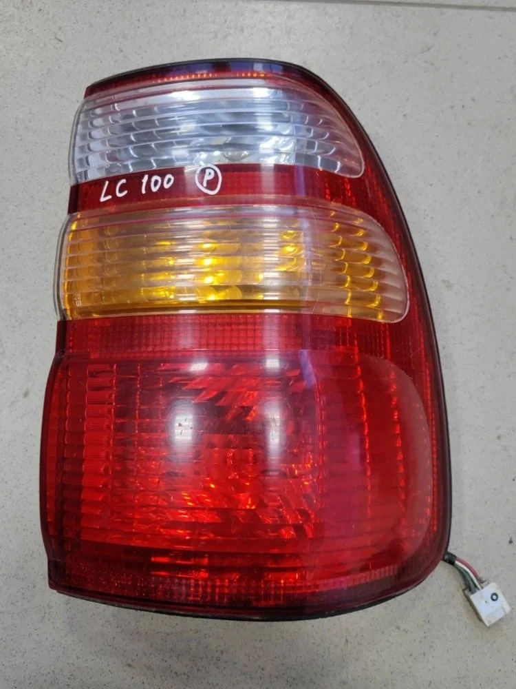 Фонарь наружний Toyota Land Cruiser 100 UZJ100