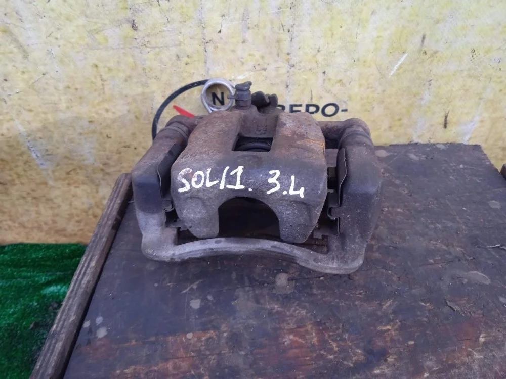 Суппорт Hyundai Solaris 2016 583001R300 RB G4FC, задний левый