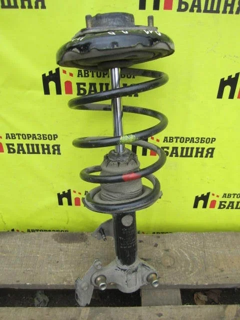 Амортизатор Nissan Primera 54302BA025 P12, передний правый