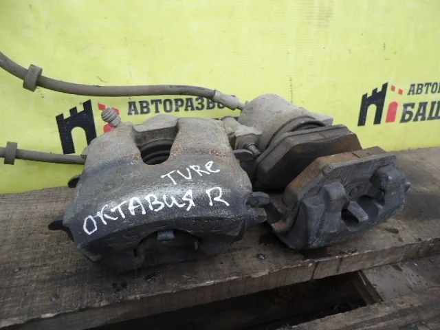 Суппорт Skoda Octavia 1K0615124D, передний правый