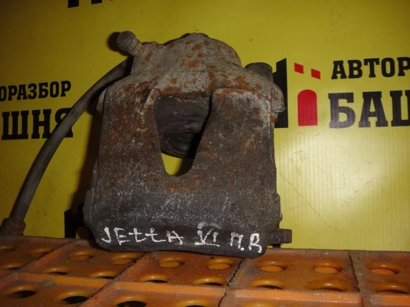 Суппорт тормозной Volkswagen Jetta 1K0615124D, передний правый