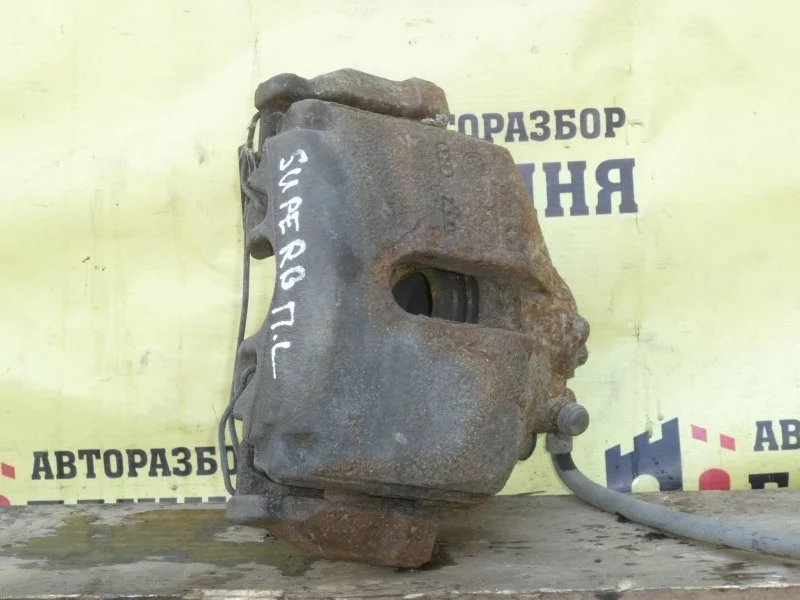 Суппорт тормозной Skoda Superb 1K0615123E, передний левый