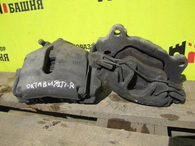 Суппорт Skoda Octavia 1K0615123D, передний левый