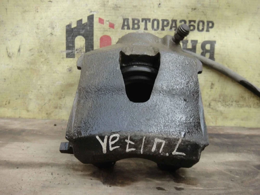 Суппорт Skoda Yeti 2014 1K0615123D CBZB, передний левый