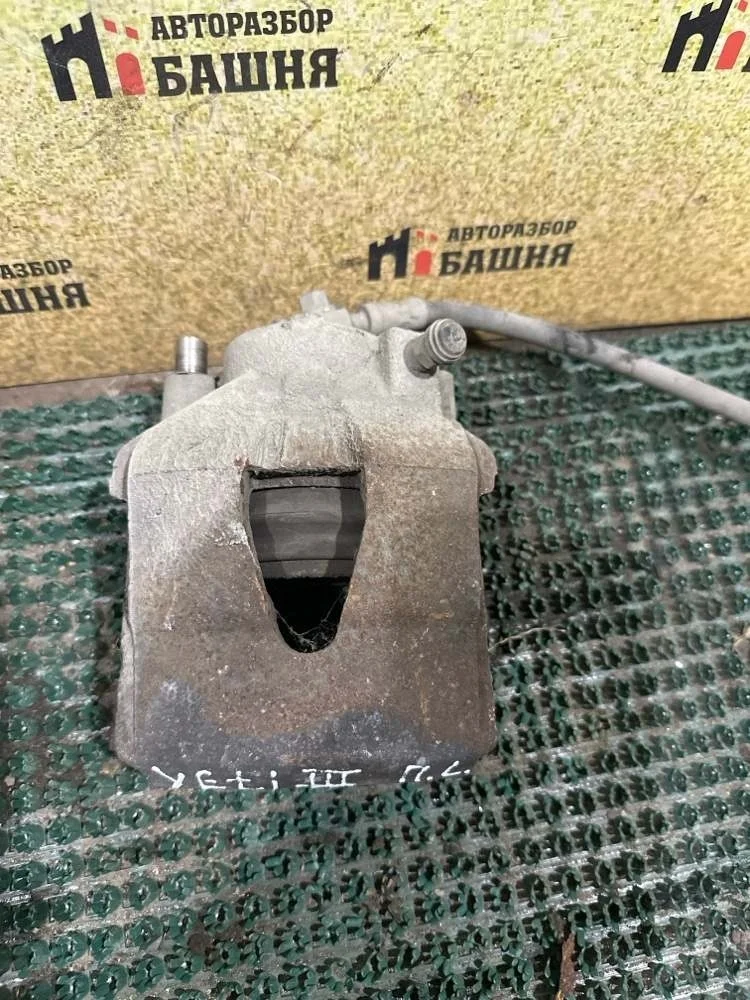 Суппорт Skoda Yeti 2013 1K0615123D CBZB, передний левый