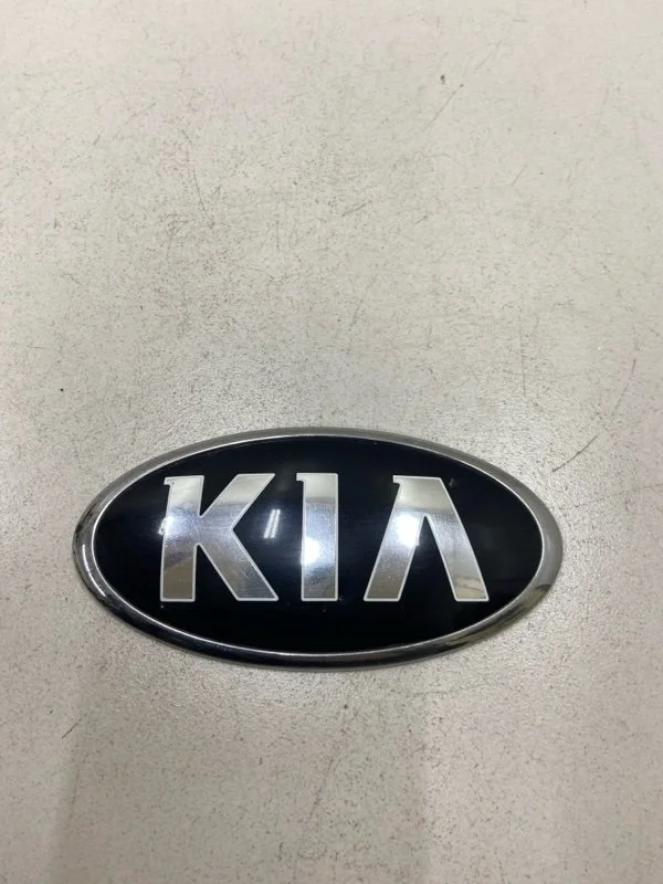Эмблема на капот Kia Rio 3 QB