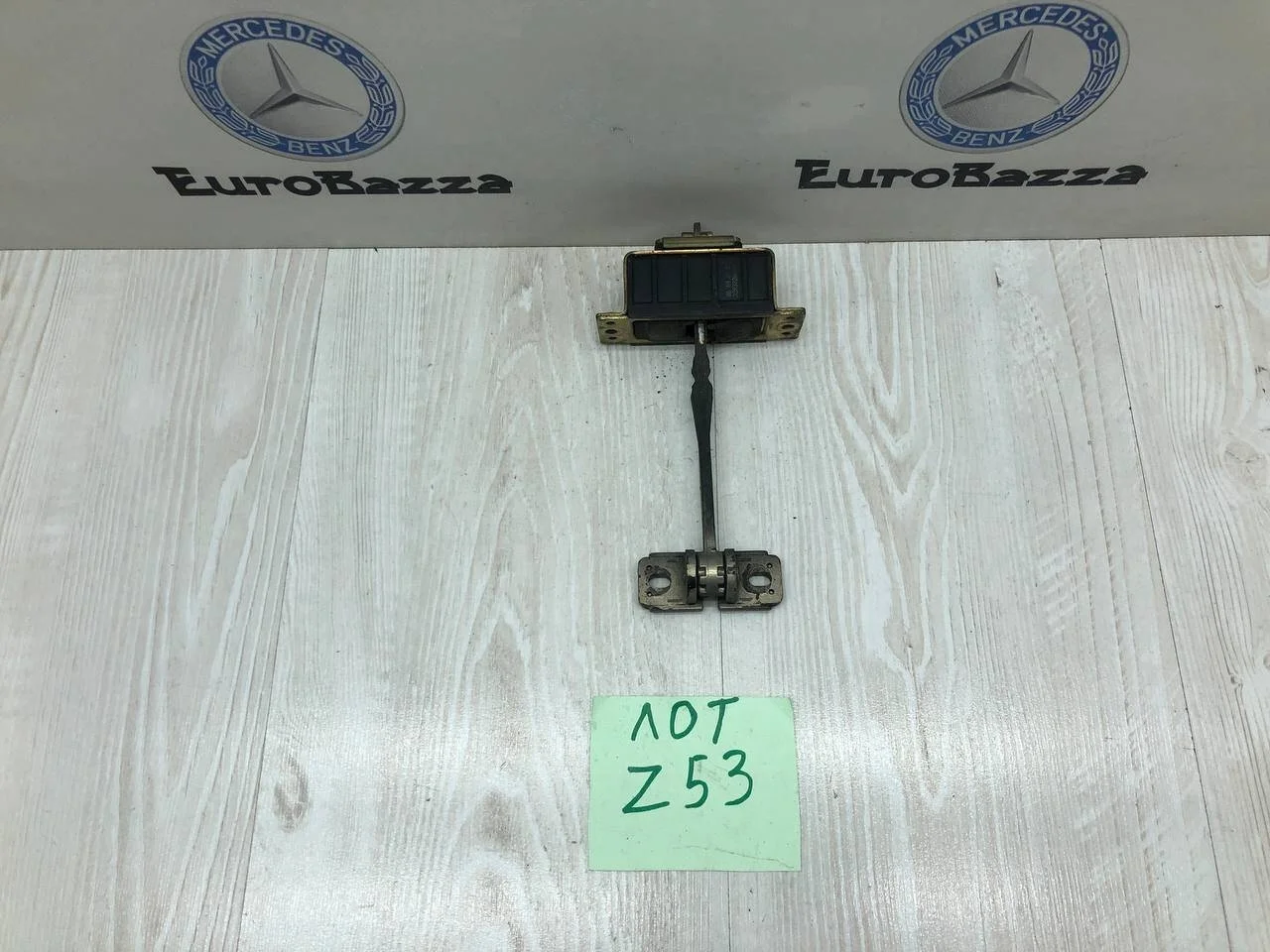 Ограничитель двери передний Mercedes W203