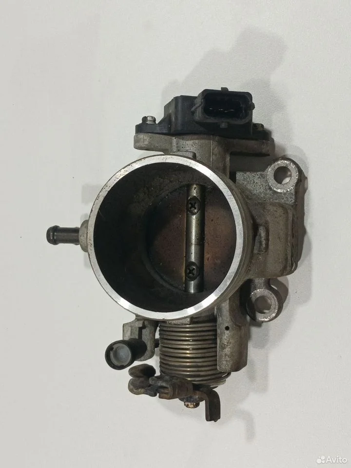 Заслонка дросленная.kia sportage 2 2005-2011