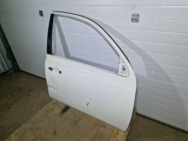 Дверь Nissan Micra K12 2009