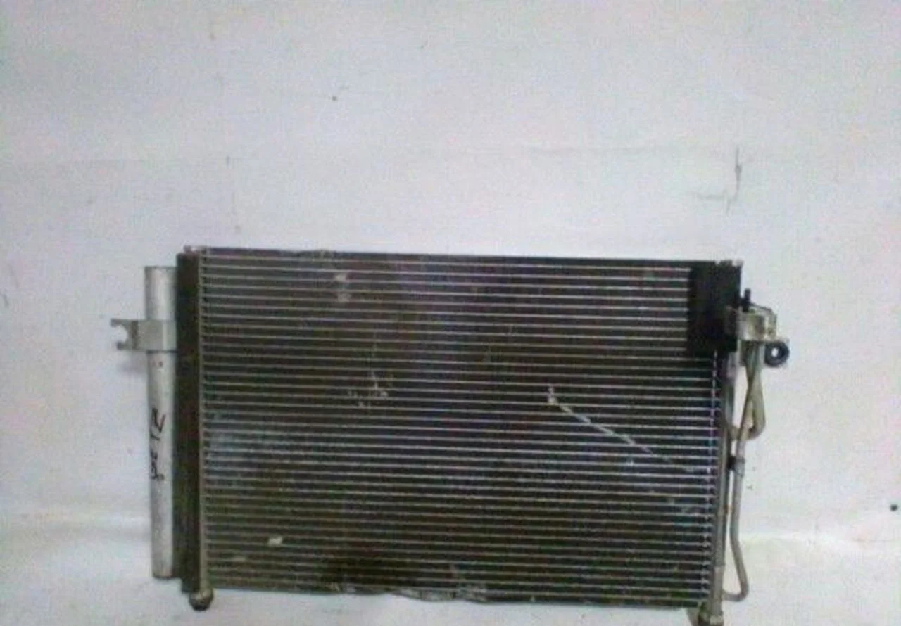 Радиатор кондиционера Hyundai Getz OEM 976061C350 (скл-1)