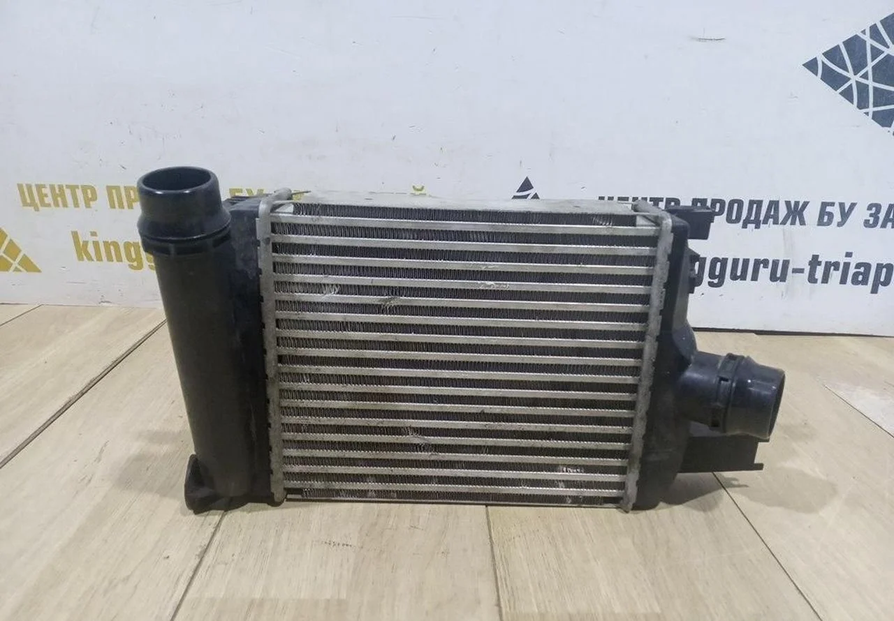 Радиатор интеркулера бу Renault Kaptur OEM 144965154R