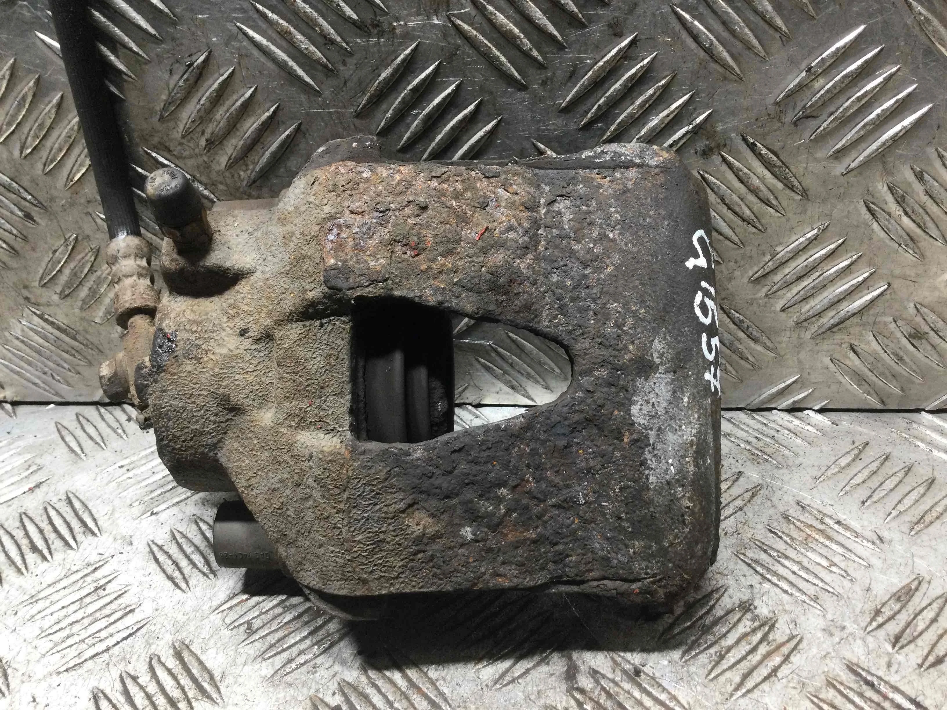 Суппорт передний левый Volkswagen Polo 4 поколение (2001-2005) бензин 1.2 i Механика Х/б