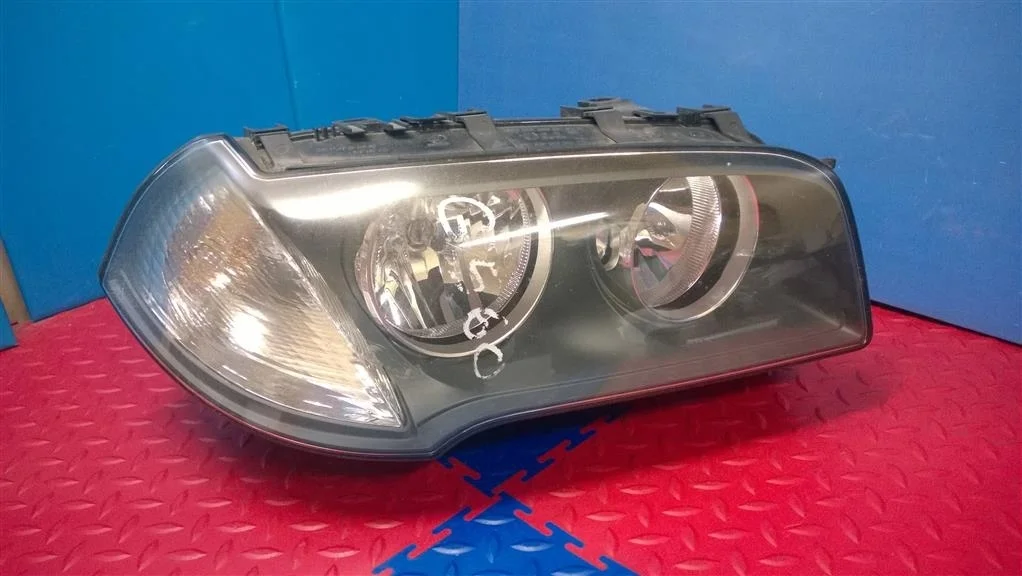 фара BMW X3 E83