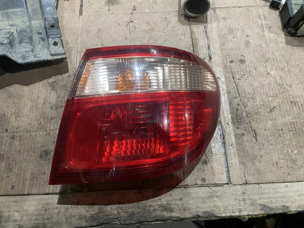 фонарь задний правый nissan almera N16 седан