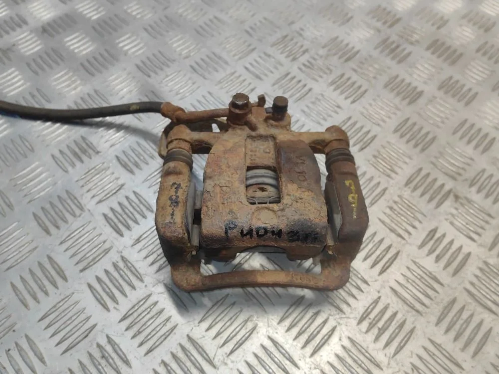 Суппорт тормозной задний правый Kia Rio IV