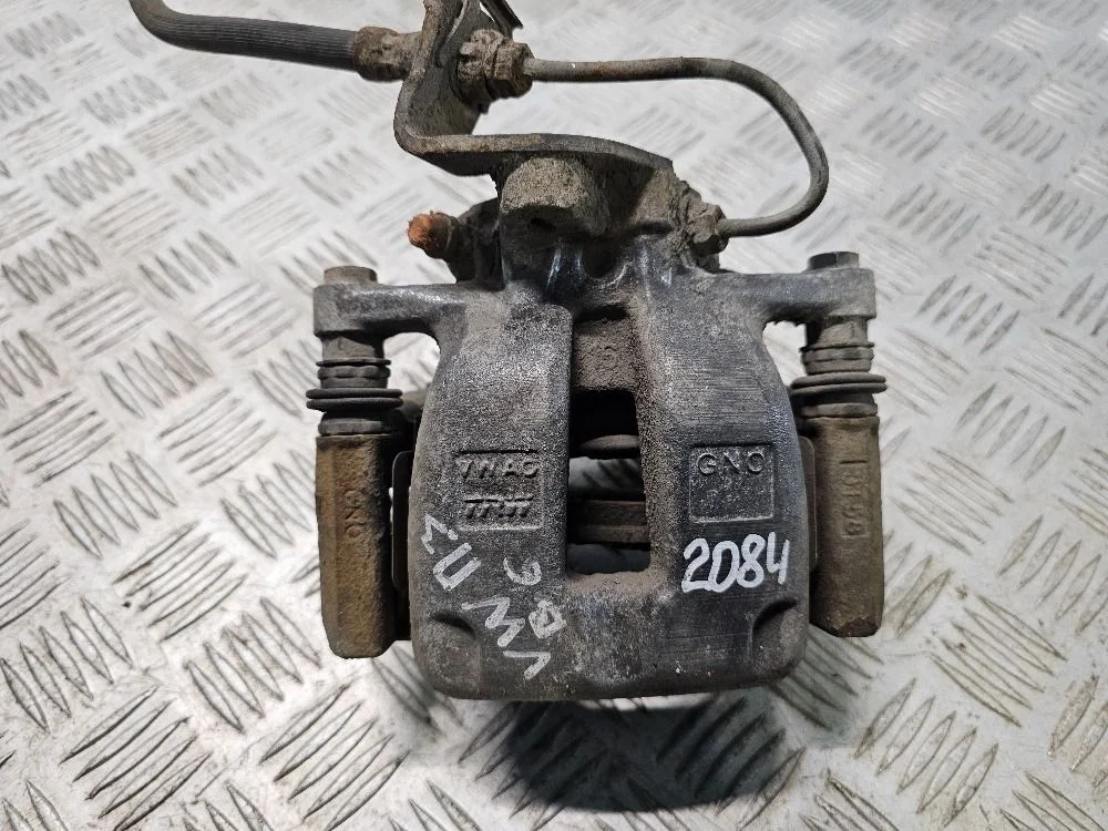 Суппорт тормозной задний правый Volkswagen Passat