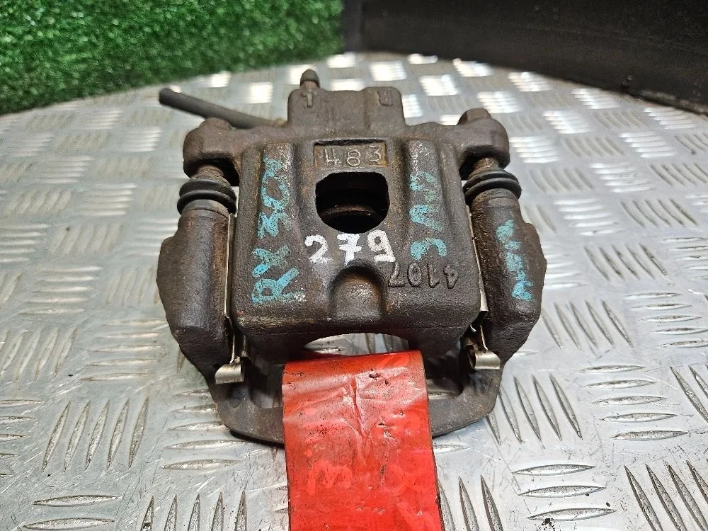 Суппорт тормозной задний левый на Lexus RX 300/330