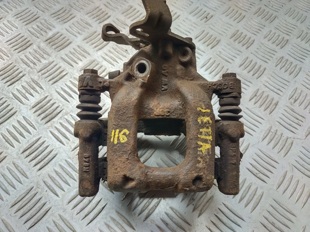 Суппорт тормозной Volkswagen Jetta