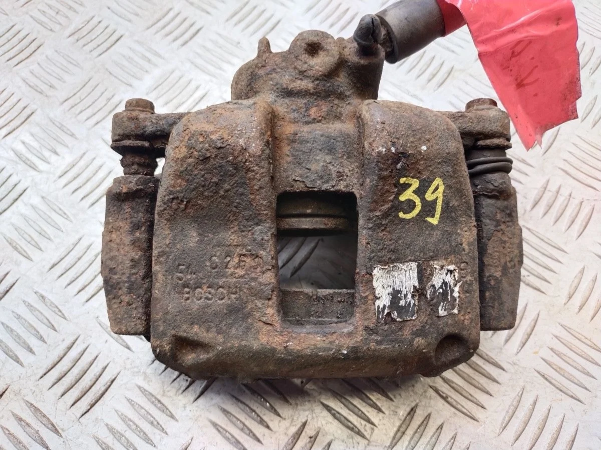 Суппорт тормозной передний левый Peugeot 307