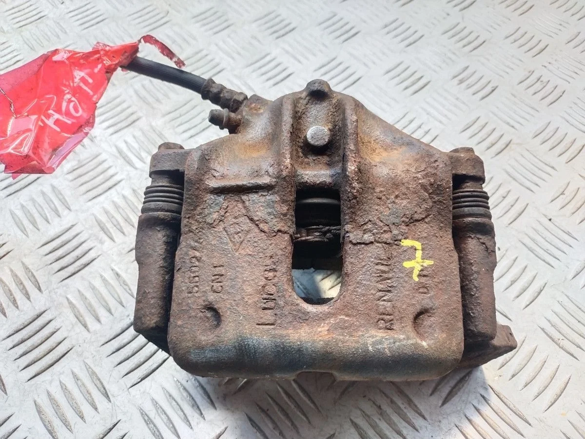 Суппорт тормозной передний правый Renault Scenic