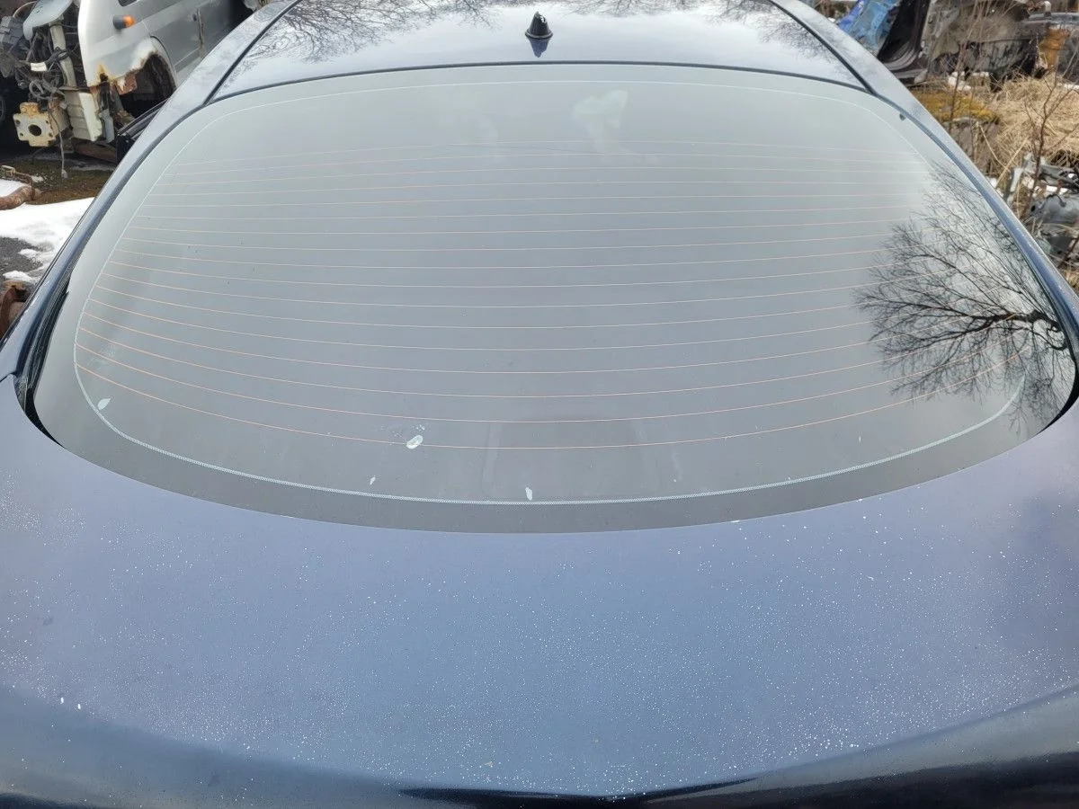 Стекло заднее на Nissan Primera P12