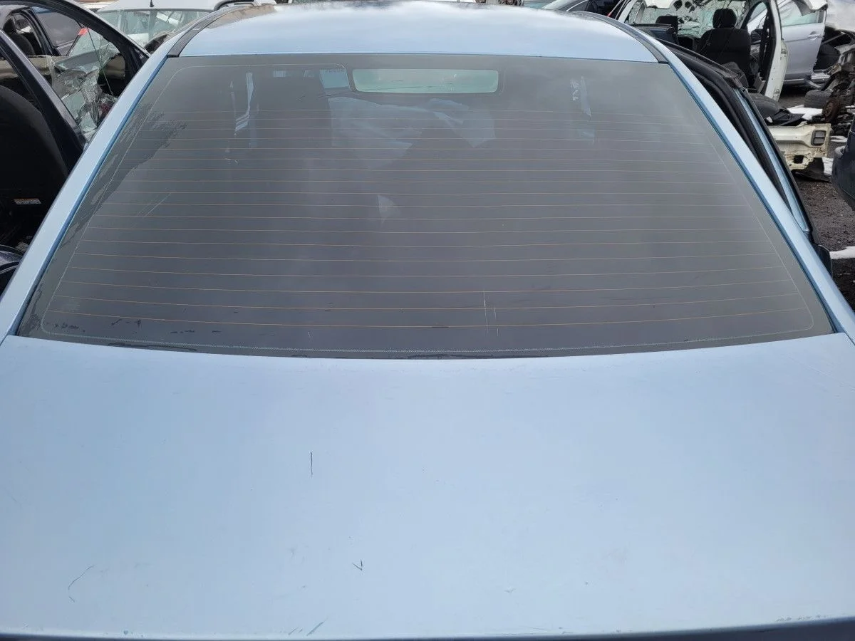 Стекло заднее на Ford Focus 2 седан