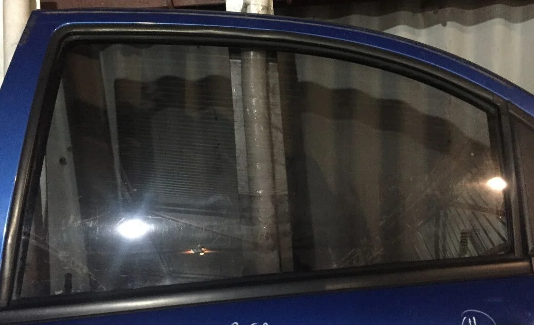 Стекло  задней левой двери Chevrolet aveo т250