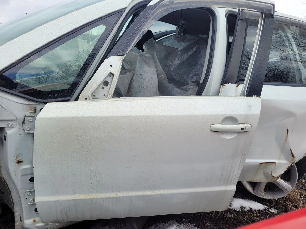 Дверь передняя левая на Suzuki SX4