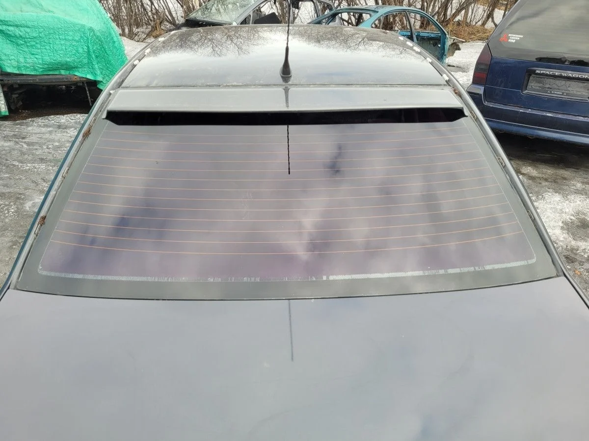 Стекло заднее на Mitsubishi Lancer 9